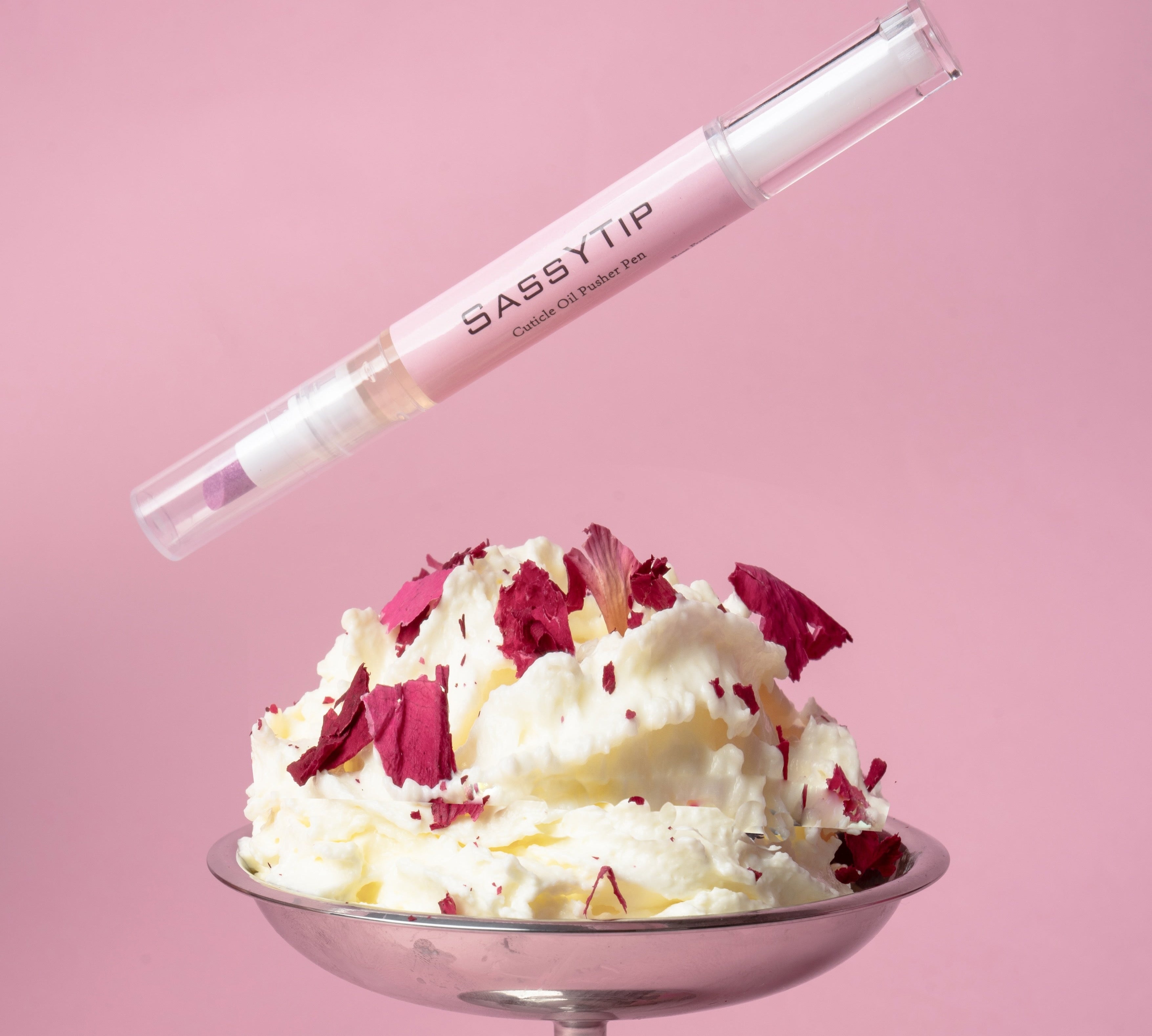 Close-up of SassyTip Cuticle Pusher Pen 2.0 tip, designed for gentle exfoliati