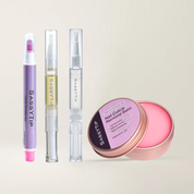 Massaging SassyTip Nail Care Trio Set softening balm into cuticles for smooth results